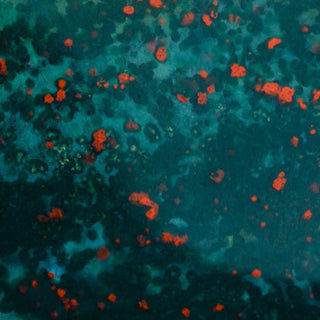 Close up image of bloodstone showing dark green with red specks